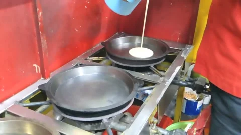 Cinematic shot. The making process of Martabak Keju Stock Footage 252946937