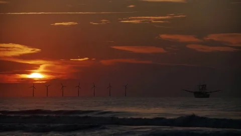 Cinematic Shot of Offshore Windmill Wind Turbines Video stock 70842002