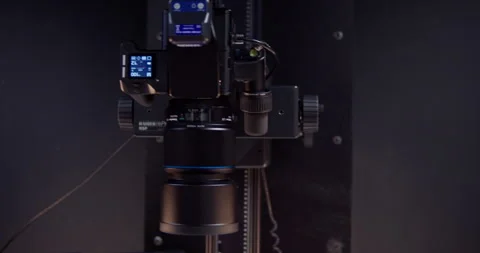 Cinematic shot of Phase One camera moving vertically on repro stand in studio. Stock Footage 313980841