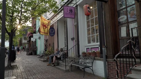 Cinematic Shot of Shops and People Along King Street in Old Town, Alexandria, VA Stock Footage