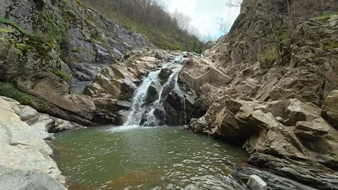 Cinematic Side View Waterfall – Calm Canyon Atmosphere 4K Video stock 332145868