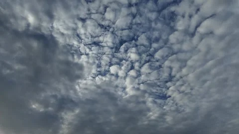 Cinematic sky timelapse featuring day clouds, sunset, night moon, and stars.. Stock Footage 334710457
