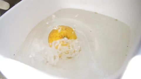 Cinematic Slow Motion Lemon splash in water Video stock 180613083