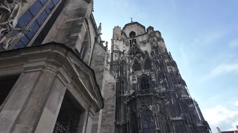 Cinematic slow motion low angle footage of St. Stephen's Cathedral in Vienna Stock Footage 343230219