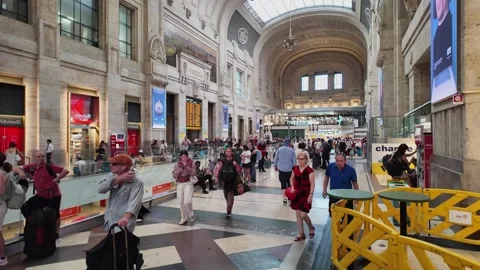 Cinematic Slow Motion of Passengers in the Train Station Stock Footage 345003604