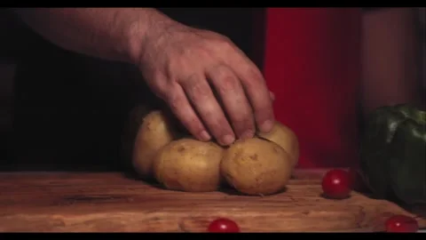 Cinematic Slow Motion Potato Selection and Transformation Stock Footage 306574603