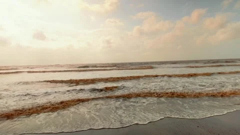 Cinematic slow motion video of waves hitting shores 動画素材 344540563