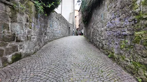 Cinematic Slow Motion Walking Through Sunlit Roman Alley Stock-Footage 332871449