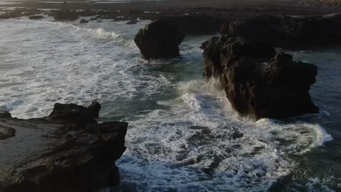 Cinematic splash of wave into the rocks bali Stock Footage 303629903