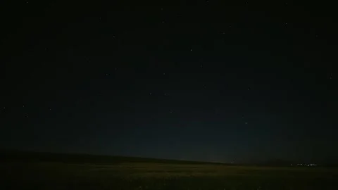 Cinematic Starry Night Over Dark Field Time-lapse Native China Lens 動画素材 333601904