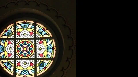 Cinematic Static Shot of Round Stained Glass Window with Figures in City Hall Stock-Footage 330369253