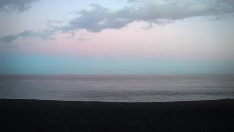 Cinematic Sunset over Black Sand Beach Stock Footage 340382632