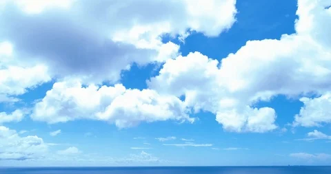 A cinematic tilt down and fly out reveal shot of the reef barrier of Aruba. Stock-Footage 98317071