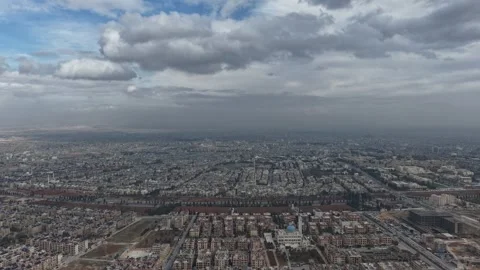Cinematic time lapse of clouds moving over Aleppo city skyline. Stock Footage 328598108