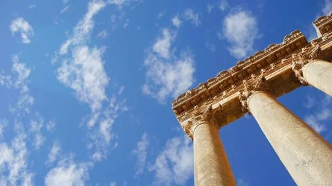 Cinematic time lapse of clouds passing roman ruins Stock Footage 232594637
