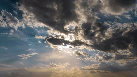 Cinematic Time-lapse of God Rays Breaking Through Sunset Clouds Stock Footage 337541407