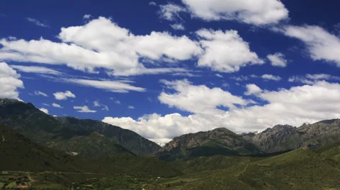 Cinematic time lapse of mountain valley with beautiful clouds changing shapes Stock Footage 41654437