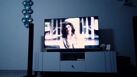 Cinematic time lapse of show played on a television screen with camera movement Stock Footage 140294160