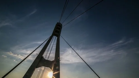 Cinematic Time lapse sun movement over city with Modern Bridge Stock-Footage 84737186