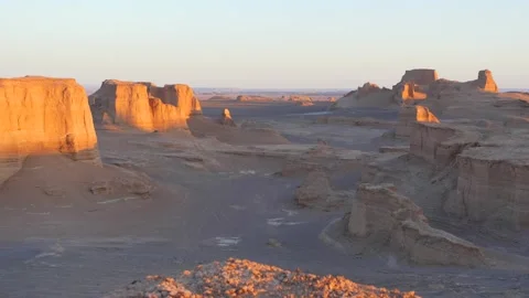 Cinematic time lapse of sunrise at Kalut Shahdad desert rock formation Iran Stock Footage 232500053