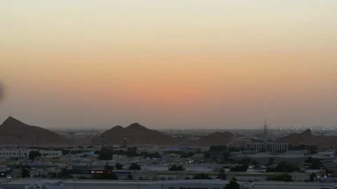 Cinematic time lapse of sunset and nightfall over city Stock Footage 232594655