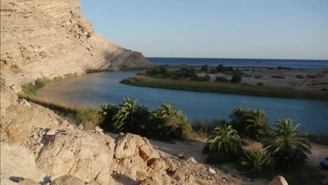 Cinematic time lapse of the sunset over a beach near Salalah, Oman Stock Footage 232499974