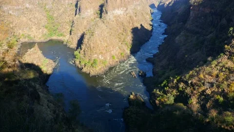 Cinematic time lapse top view of the wild Zambezi River just below Victoria Stock Footage 232029256