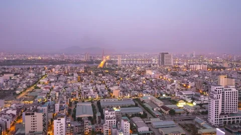 Cinematic time-lapse view of an industrialized city in Asia from night to day. Stock Footage 154521267