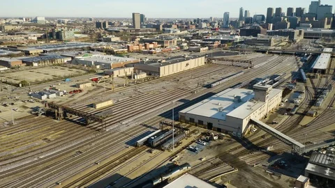 Cinematic Tracking of Amtrak Metro Train in Chicago railyard [4K] Stock Footage 110544737