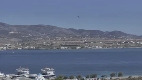 Cinematic Tracking and Push-In View of Antiparos, Greece's Idyllic Coastal Town Stock Footage 254112656