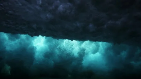 Cinematic Underwater View of Powerful Ocean Wave Breaking Overhead Stock Footage 326097488