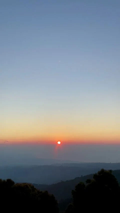 Cinematic Vertical Panning Sunset over Mountain Ridges in Munduk Bali Stock Footage 335825754