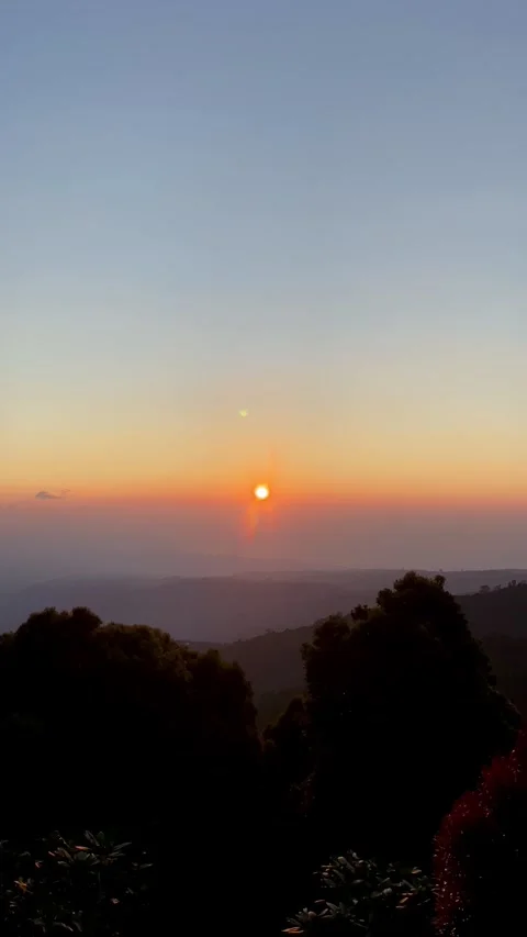 Cinematic Vertical Sunset with Glowing Sun over Munduk Mountain Bali Stock Footage 335825737
