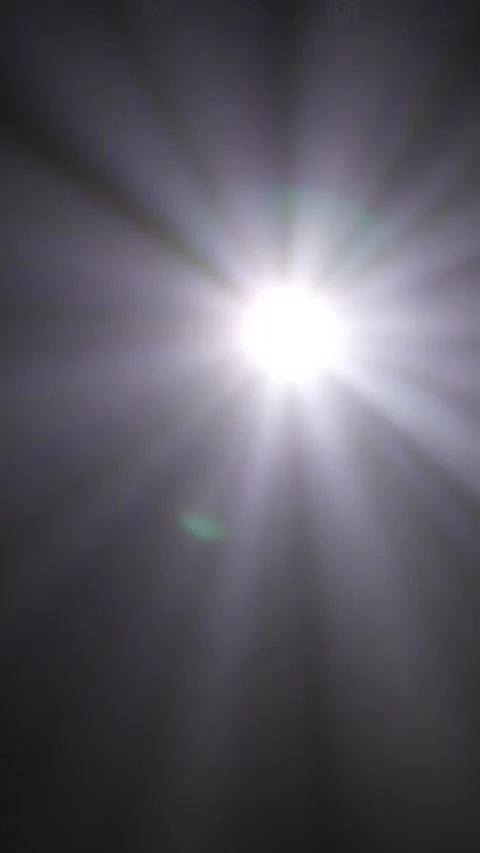 Cinematic vertical view of bright white spotlight creating intense light Vidéo 345704770
