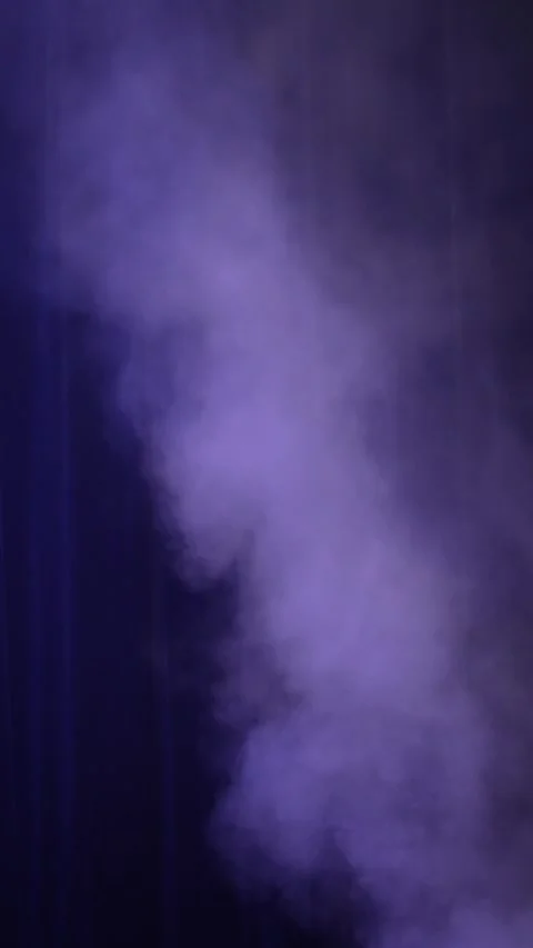 Cinematic vertical view of thick purple fog rolling and rising Vidéo 345703981