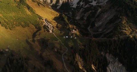 Cinematic view of alps hut mountain summit peak Zimba, Austria sunrise Stock Footage 80954058