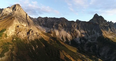 Cinematic view of alps mountain ridge and summit peak Zimba, Austria sunrise Video stock 80924216