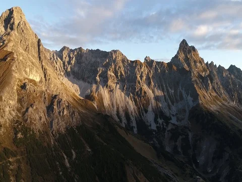 Cinematic view of alps mountain ridge and summit peak Zimba, Austria sunrise Video stock 80962404