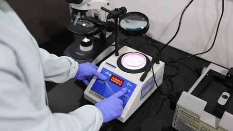 Cinematic view of bacteria test process in the pharma testing lab Stock Footage 304850563