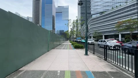 Cinematic View of a Construction Site and Urban Walkway in BGC 4k 60fps Vidéo 339206341