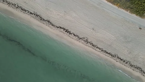 Cinematic view from the drone to the sandy beach Stock Footage 154144223