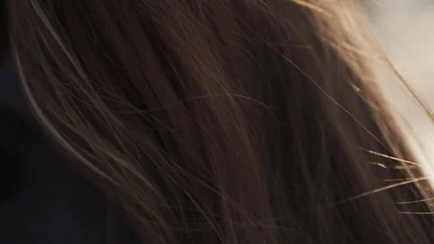 Cinematic view emphasizing shine and vibrant hair color. Close examination of Stock Footage 342430142