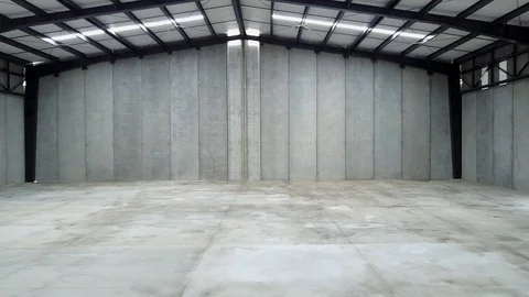 Cinematic view of an empty  warehouse Stock Footage 118996168