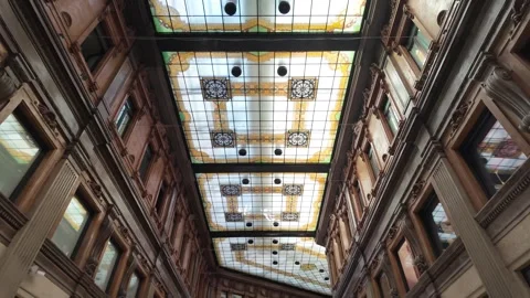 Cinematic View Of The Ornate Glass Ceiling In Galleria Alberto Sordi Rome Stock Footage 338009583