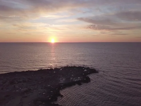 Cinematic view over the sea at sunset with 4k drone Stock Footage 85090643