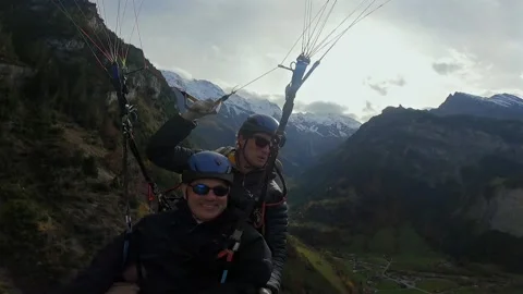 Cinematic view of a paragliding Stock Footage 295831362