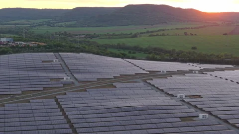 Cinematic View of Renewable Solar Array in Bulgaria During Sunset – Green Power Stock Footage 309023992