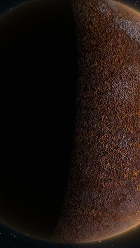 Cinematic view of a rocky planet in partial eclipse against a starry space .. Stock Footage 324036491