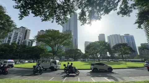 Cinematic View of a Roundabout and Traffic in BGC 4k 60fps Video stock 339207101