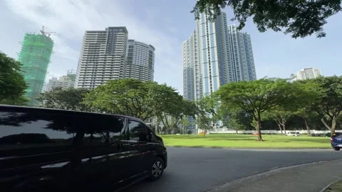 Cinematic View of a Roundabout and Traffic in BGC 4k 60fps Video stock 339207347